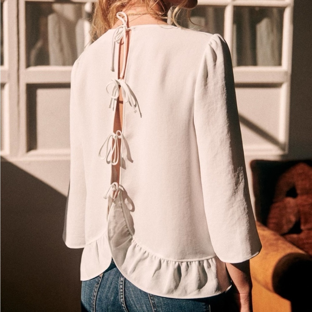 Sezane Debbie Blouse White Back Tie Ruffle Hem Round Neck Sz 40 US L